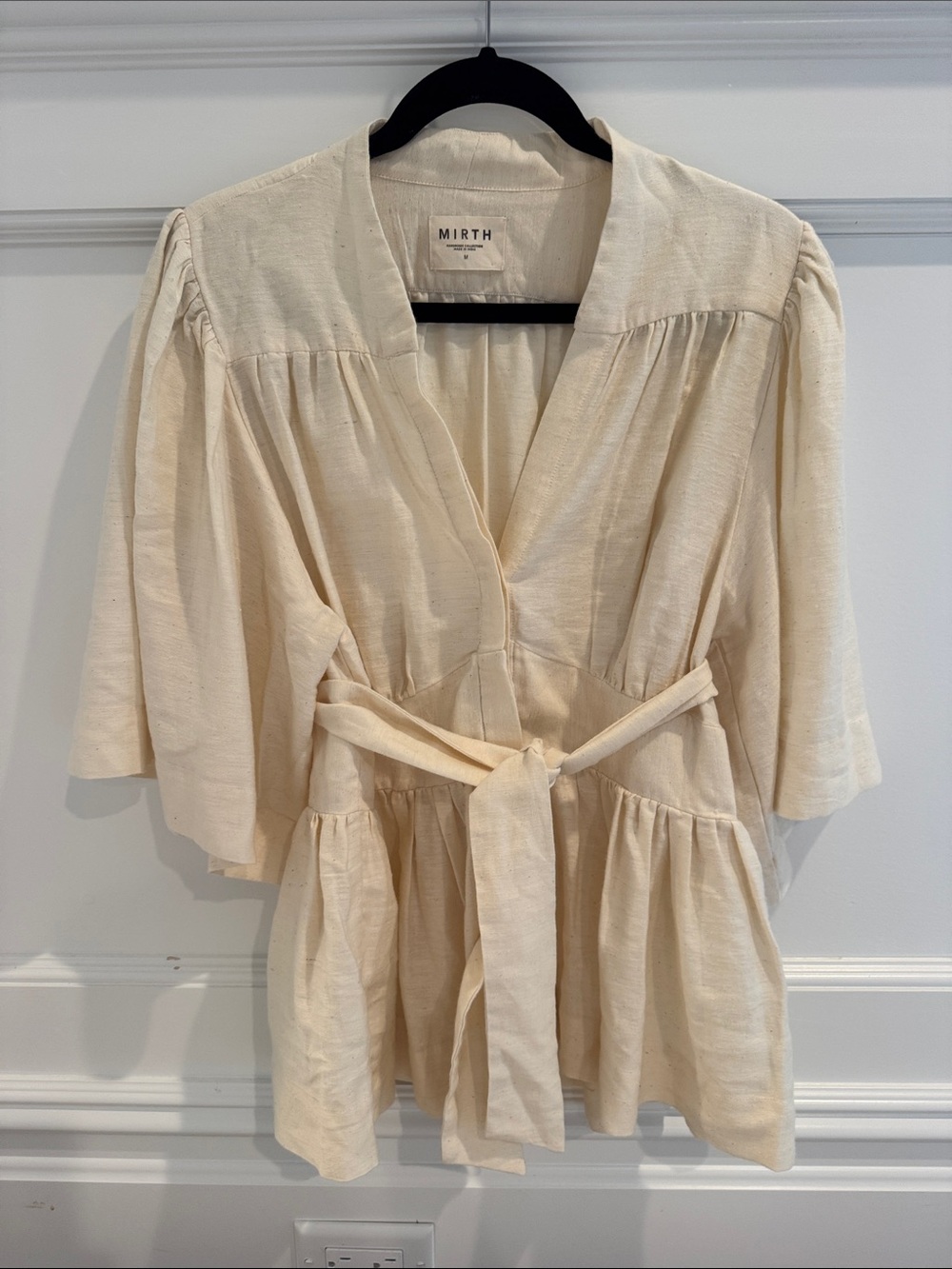 Mirth Cream Tie-Waist Peplum Blouse